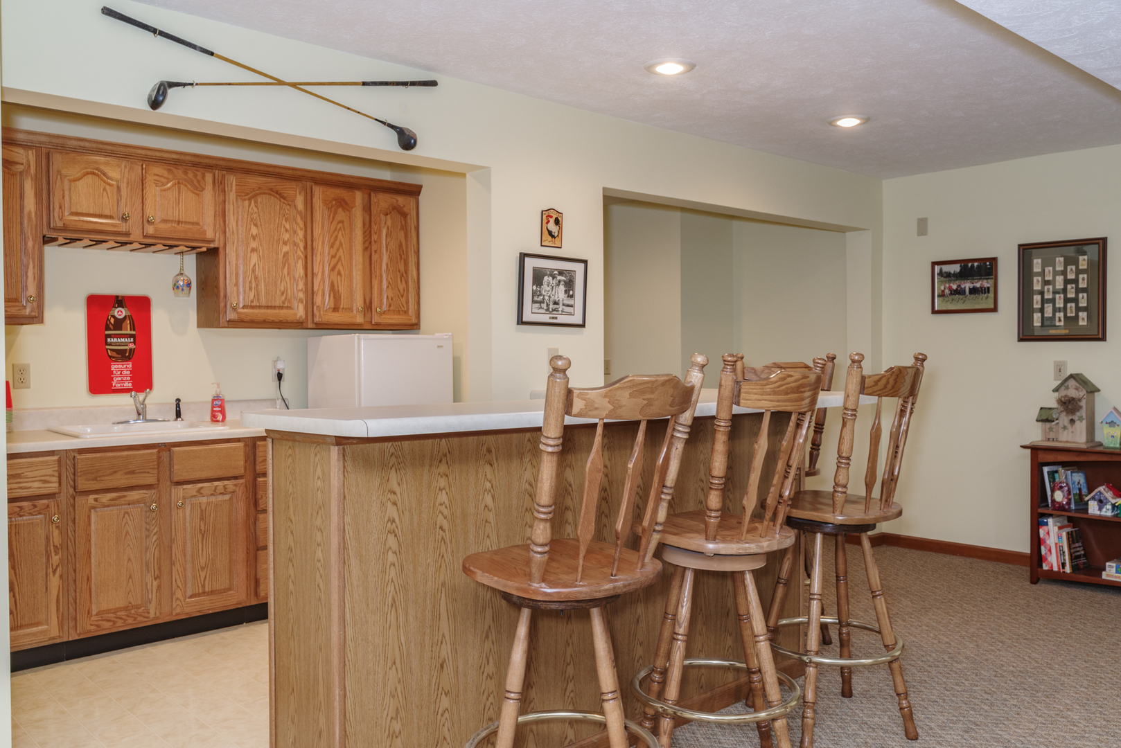 1908 Hackberry Road Bloomington, IL 61704 - Photo 38 of 50 a kitchen with stainless steel appliances granite countertop a dining table chairs and a refrigerator