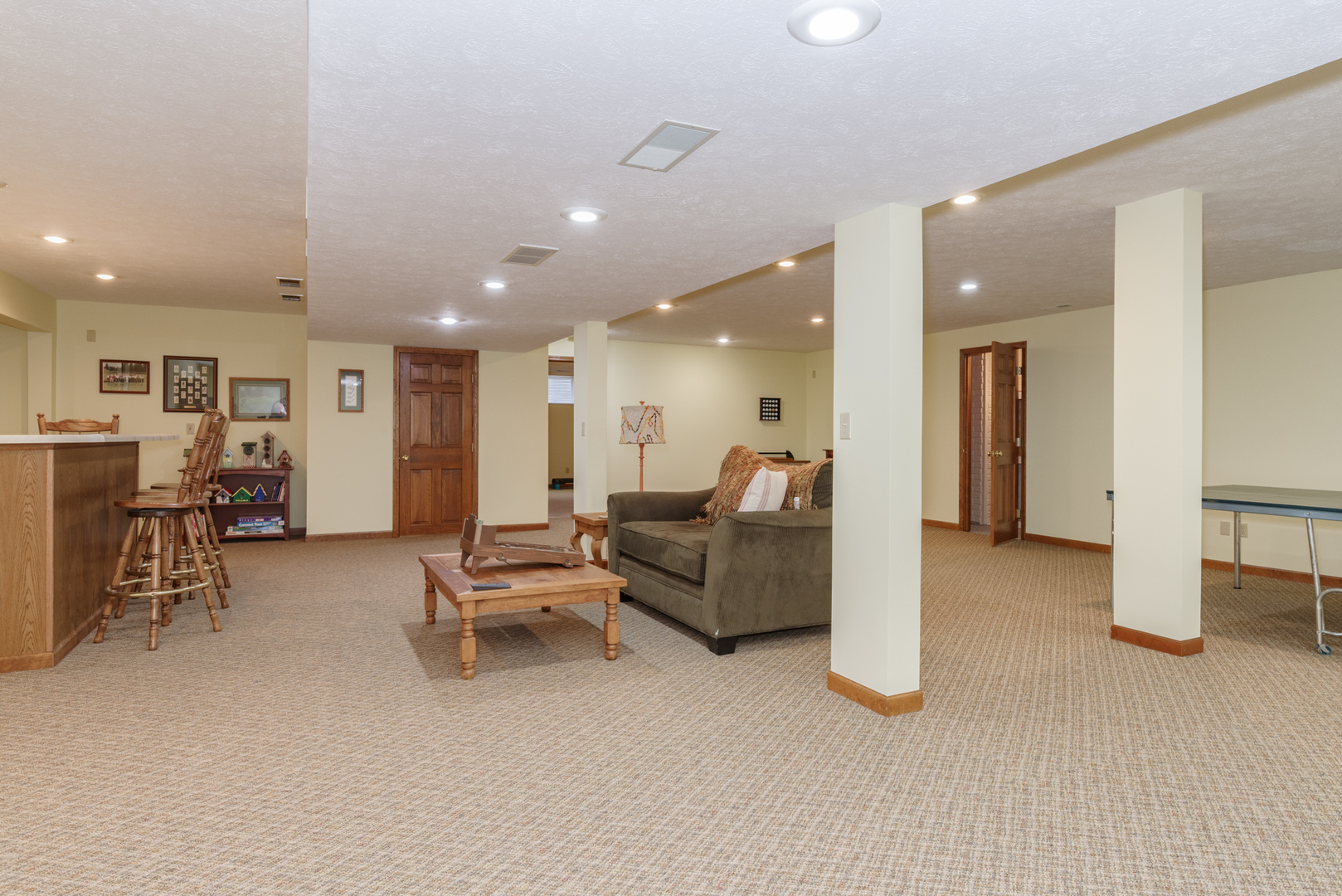 1908 Hackberry Road Bloomington, IL 61704 - Photo 39 of 50 a living room with furniture and a table