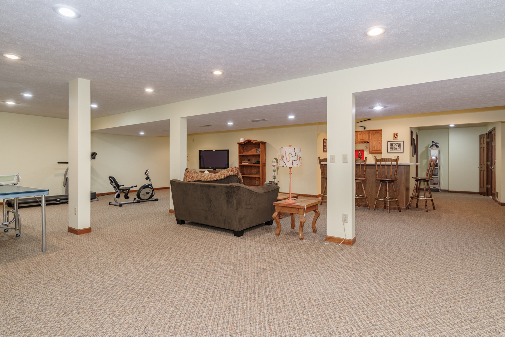 1908 Hackberry Road Bloomington, IL 61704 - Photo 40 of 50 a living room with furniture and a table