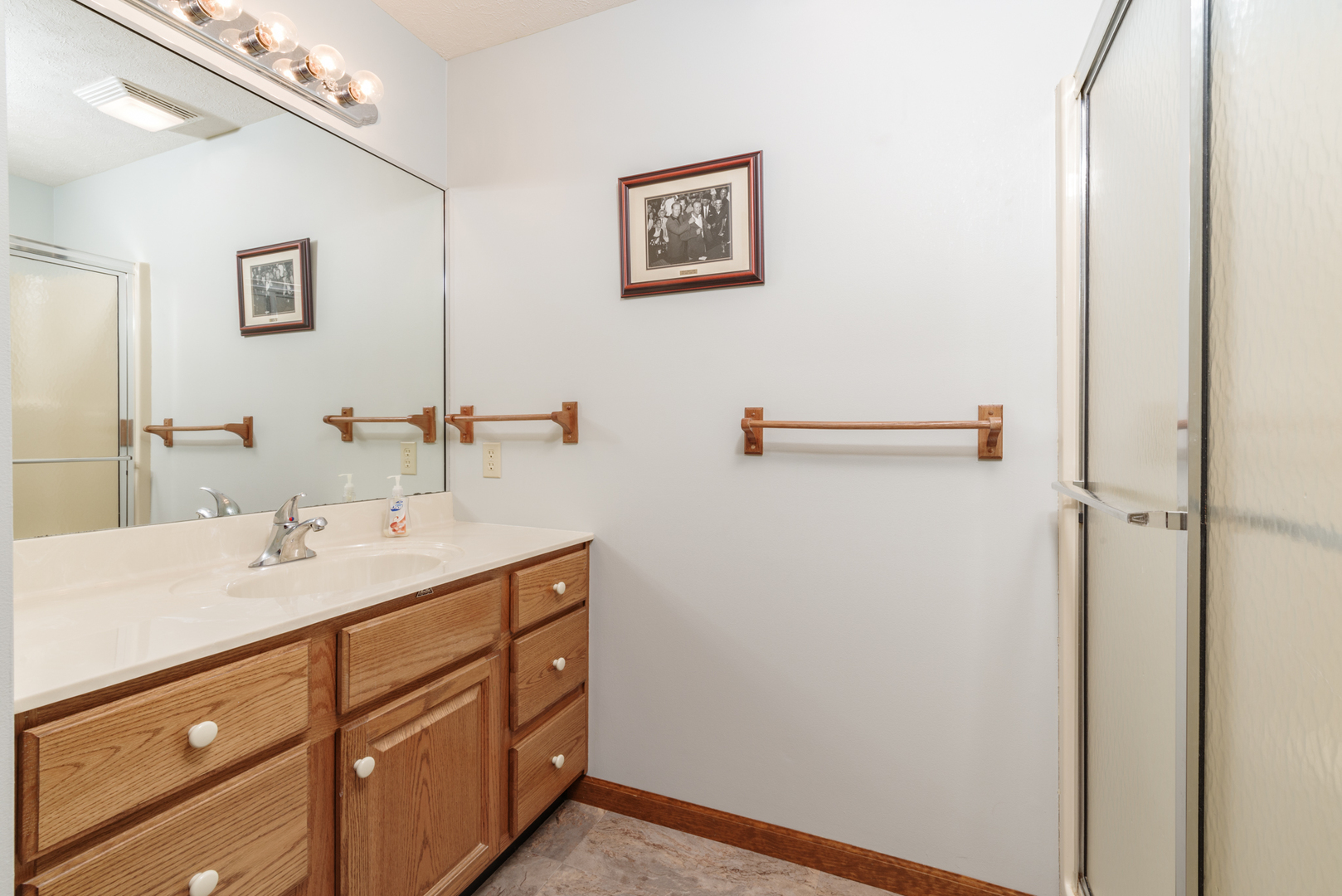 1908 Hackberry Road Bloomington, IL 61704 - Photo 42 of 50 a bathroom with a sink and a mirror