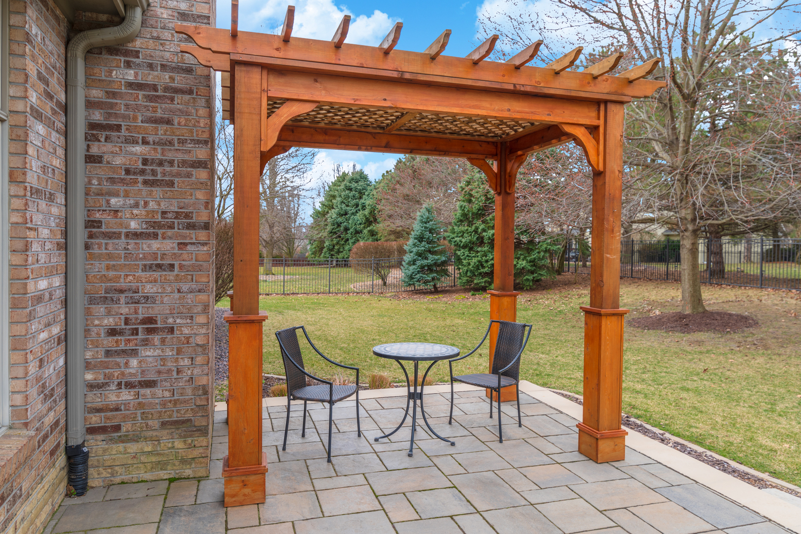 1908 Hackberry Road Bloomington, IL 61704 - Photo 48 of 50 a view of porch with a table and chairs