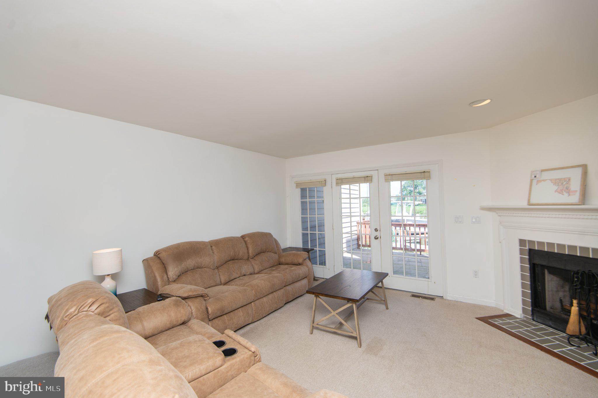 101 Main Street, Unit 119 Secretary, MD 21664 - Photo 11 of 58 Bright and inviting living space.