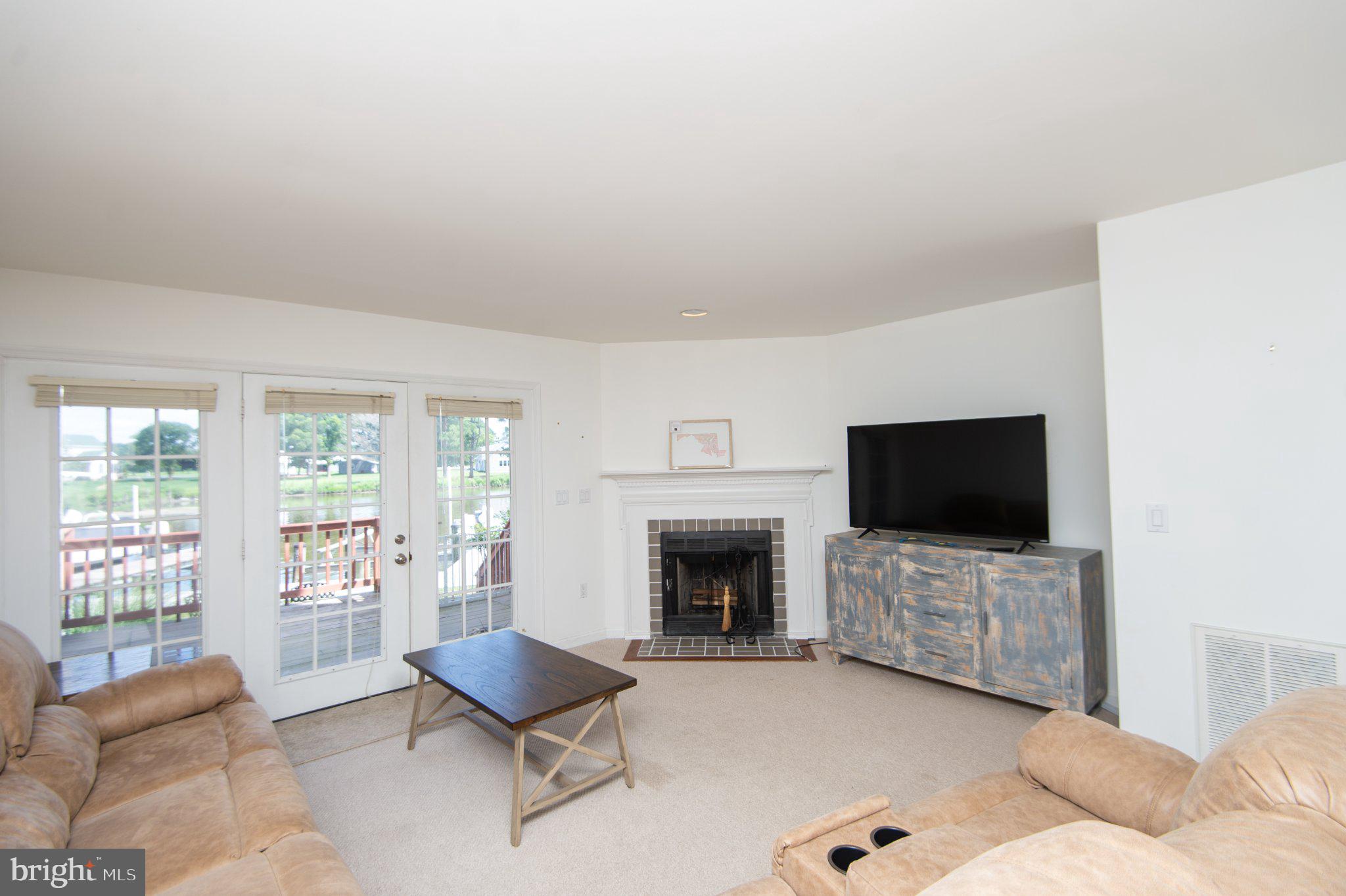 101 Main Street, Unit 119 Secretary, MD 21664 - Photo 12 of 58 Bright and inviting living space.