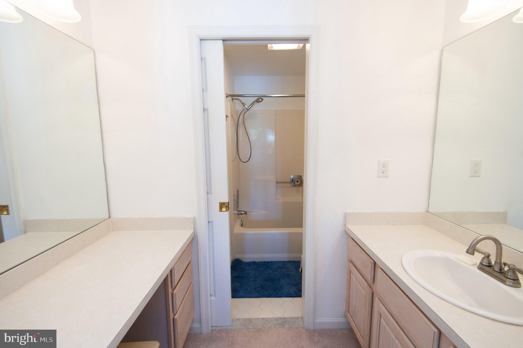 101 Main Street, Unit 119 Secretary, MD 21664 - Photo 30 of 58 Bright and airy bathroom retreat.