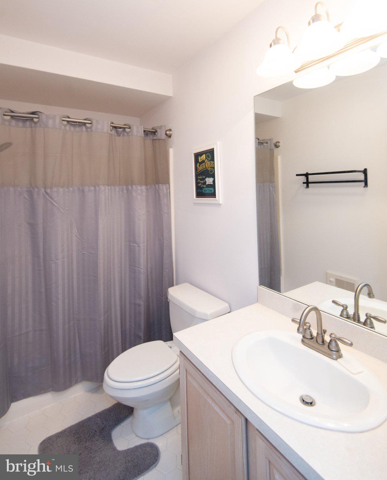 101 Main Street, Unit 119 Secretary, MD 21664 - Photo 34 of 58 Modern bathroom with sleek finishes.