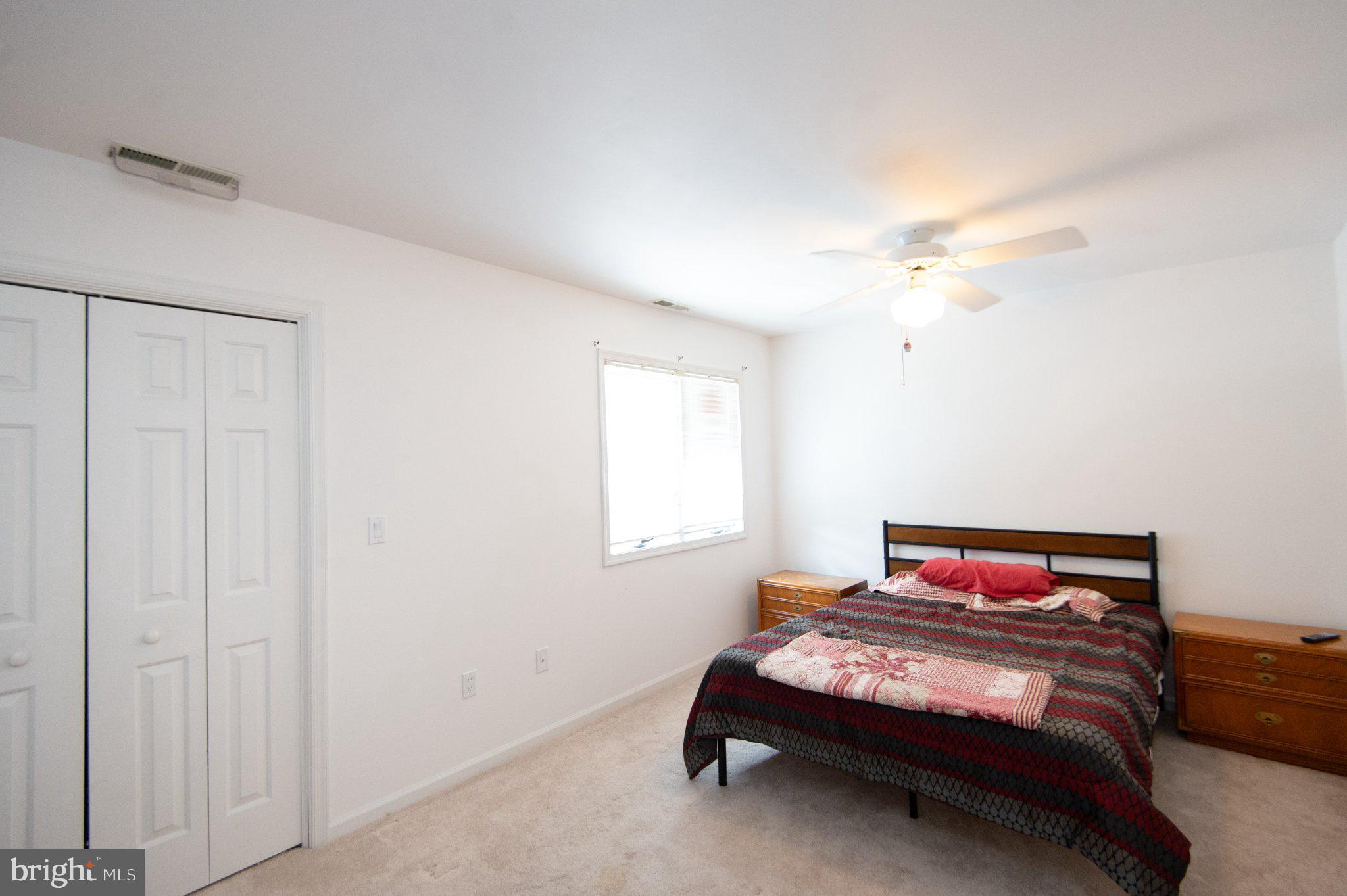101 Main Street, Unit 119 Secretary, MD 21664 - Photo 35 of 58 Bright and airy bedroom retreat.