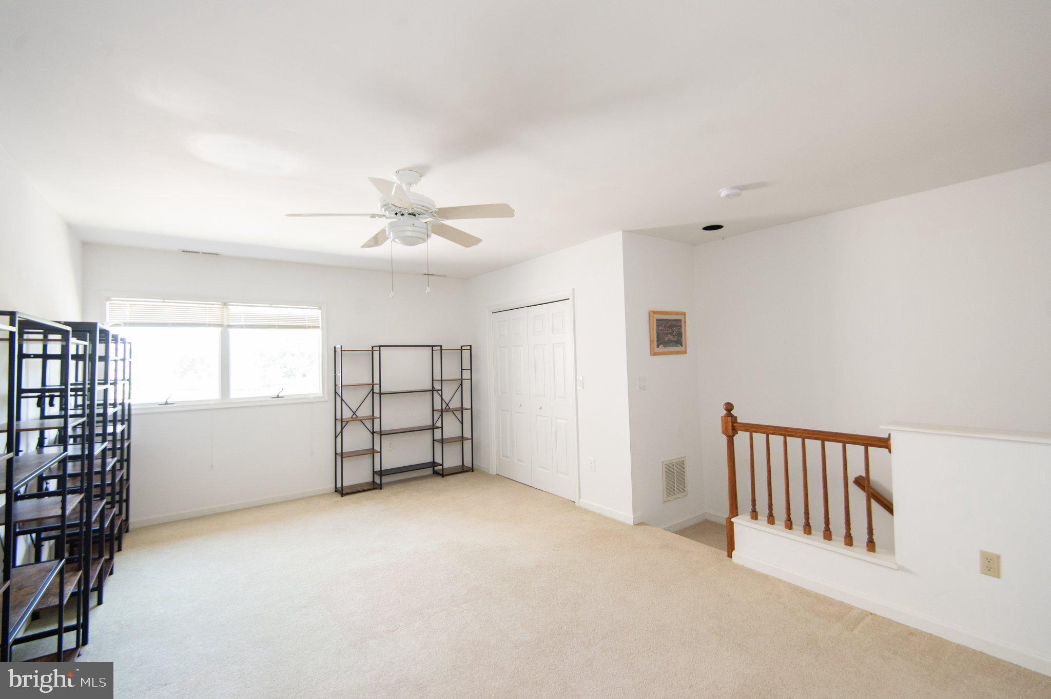 101 Main Street, Unit 119 Secretary, MD 21664 - Photo 40 of 58 Spacious room with natural light.