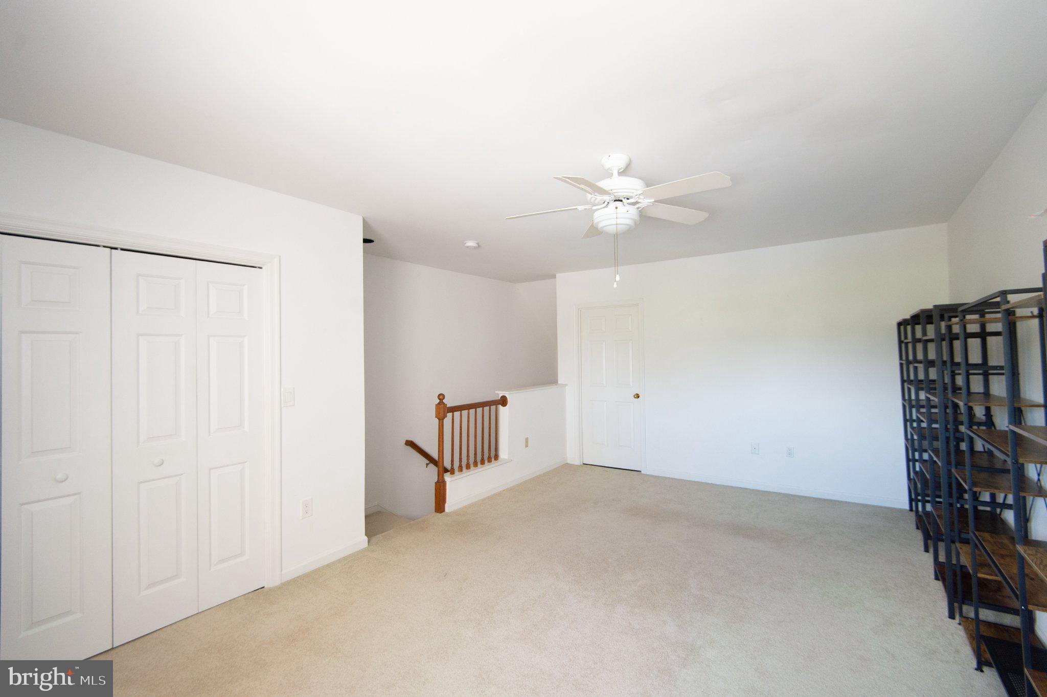 101 Main Street, Unit 119 Secretary, MD 21664 - Photo 41 of 58 Spacious, light-filled living area.