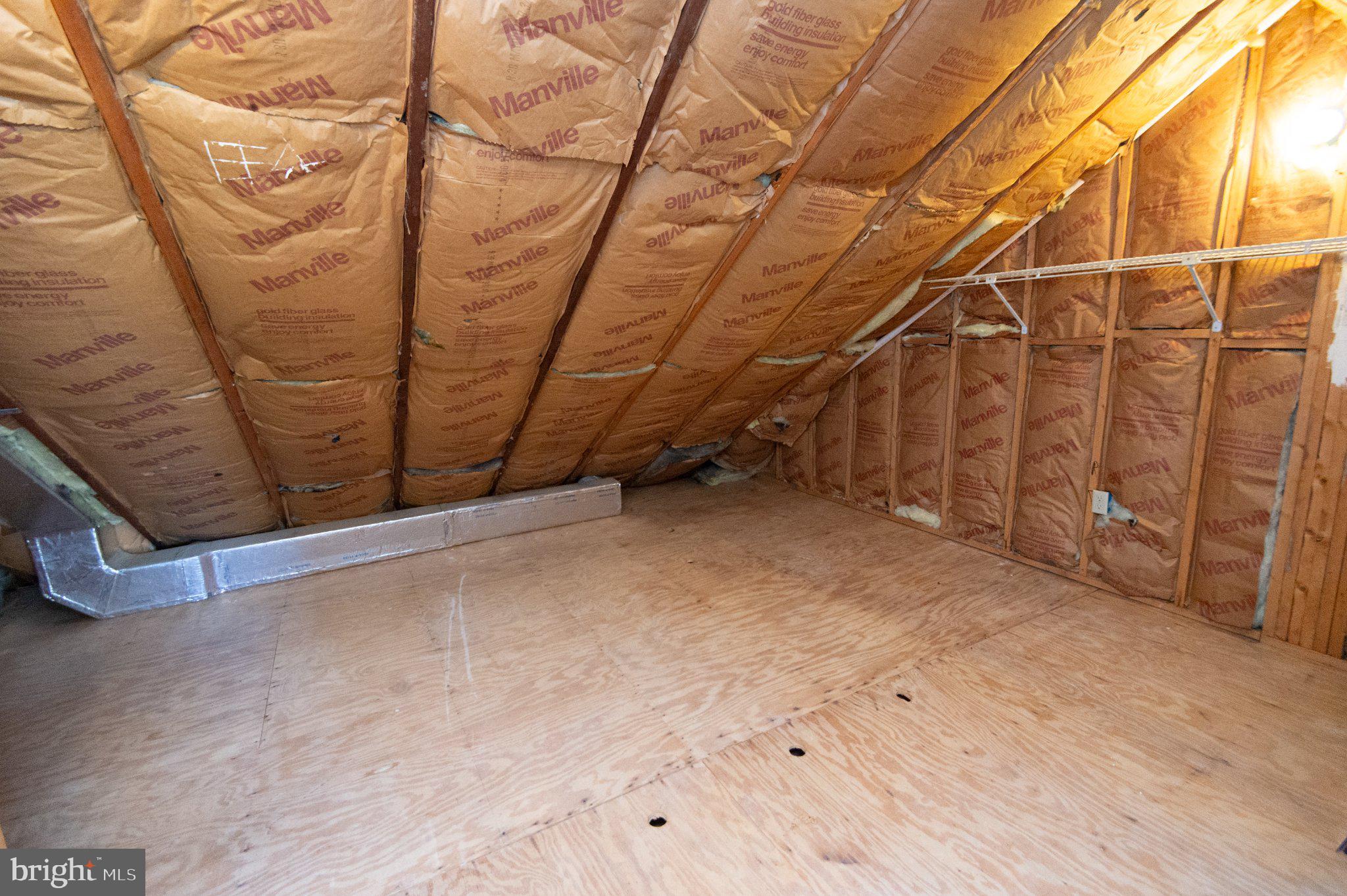 101 Main Street, Unit 119 Secretary, MD 21664 - Photo 43 of 58 Spacious attic ready for transformation.