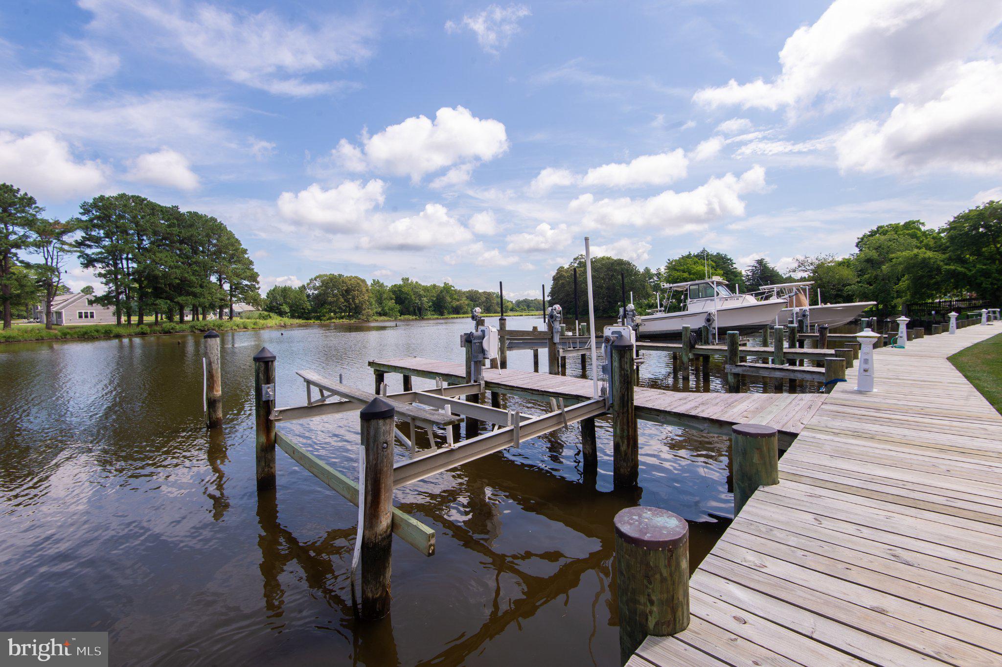 101 Main Street, Unit 119 Secretary, MD 21664 - Photo 45 of 58 Tranquil waterfront dock scene