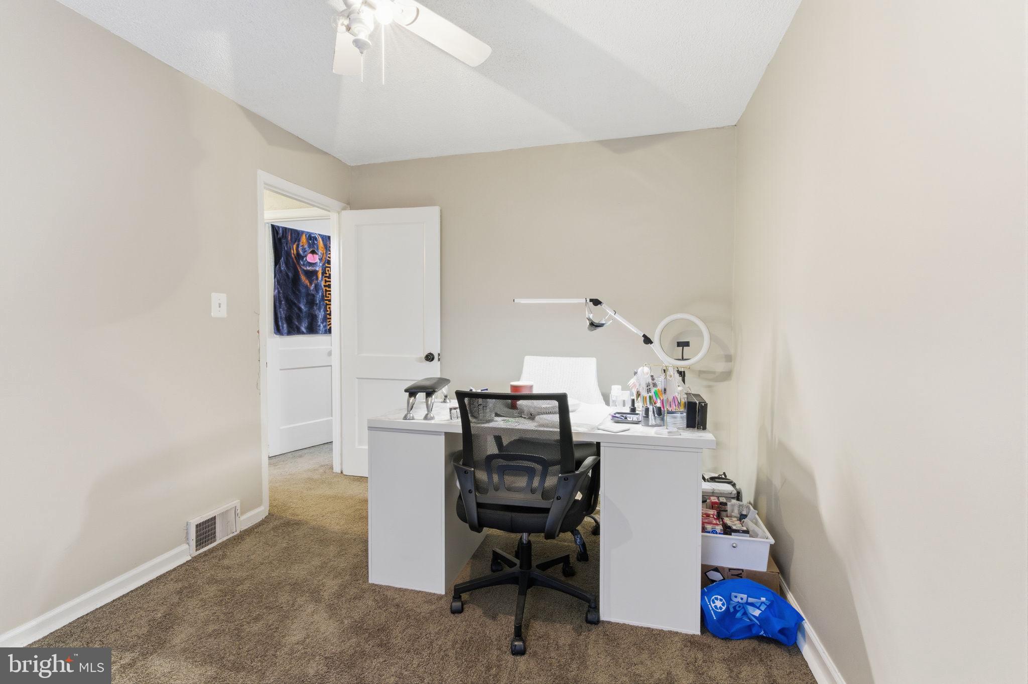 4524 Robbins Street Philadelphia, PA 19135 - Photo 11 of 26 a view of a workspace with furniture