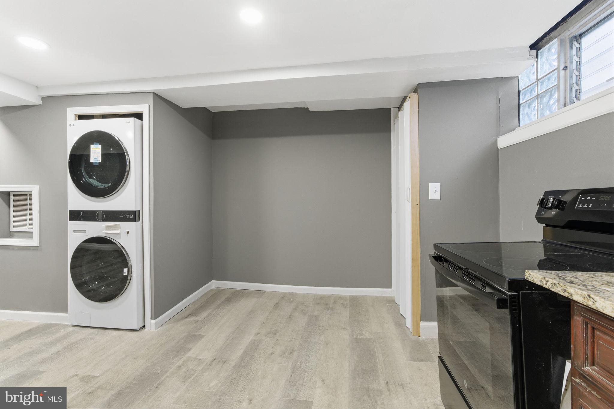 4524 Robbins Street Philadelphia, PA 19135 - Photo 22 of 26 a view of a kitchen with washer and dryer