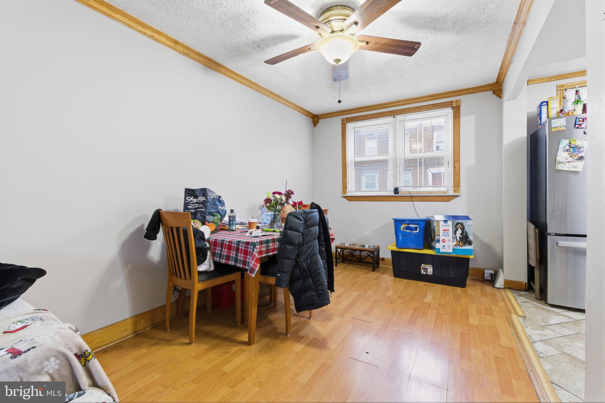 4524 Robbins Street Philadelphia, PA 19135 - Photo 6 of 26 a workspace with furniture window and wooden floor