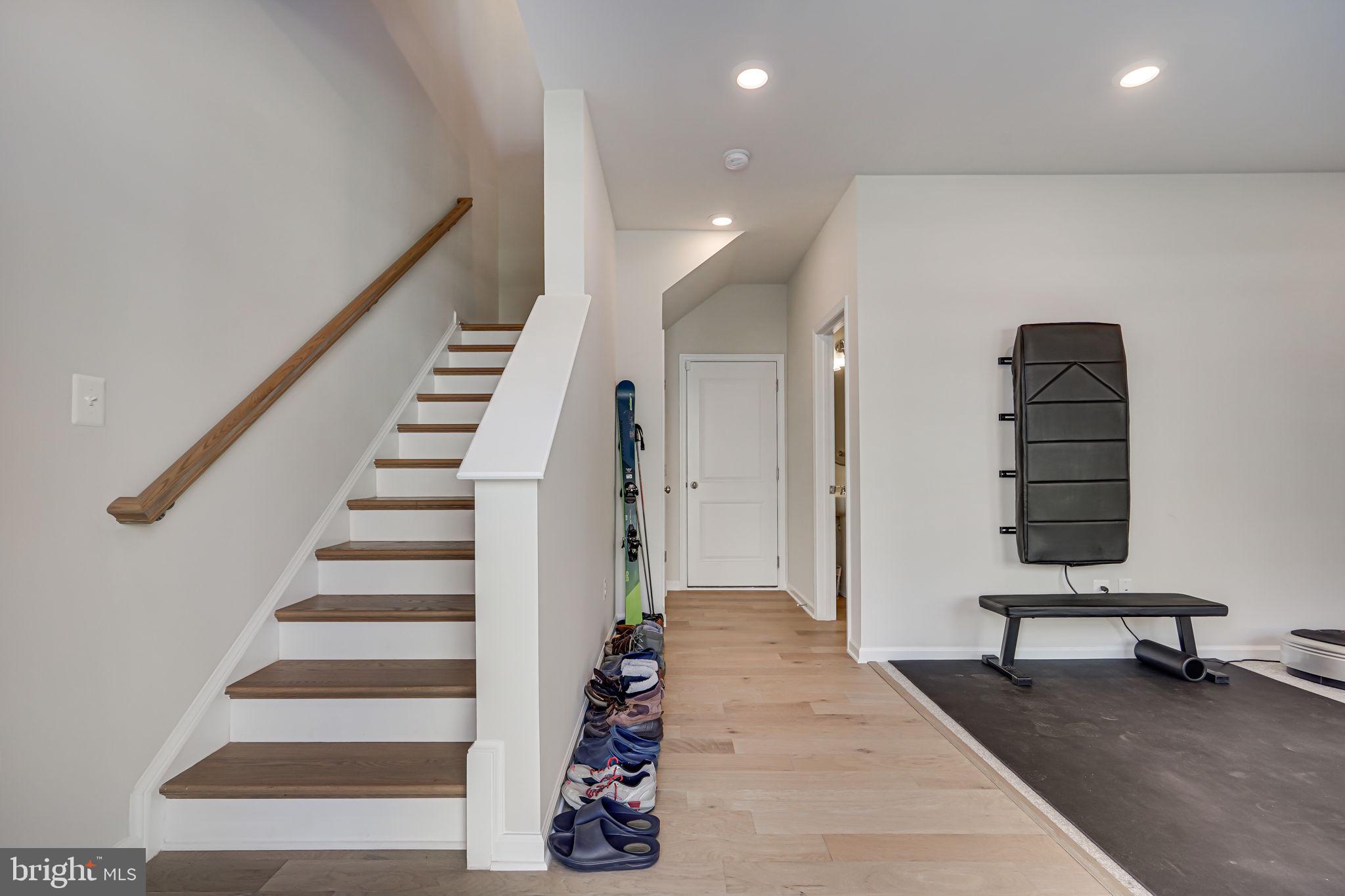 9536 Barnes Loop Manassas, VA 20110 - Photo 2 of 24 a view of entryway and hall with wooden floor