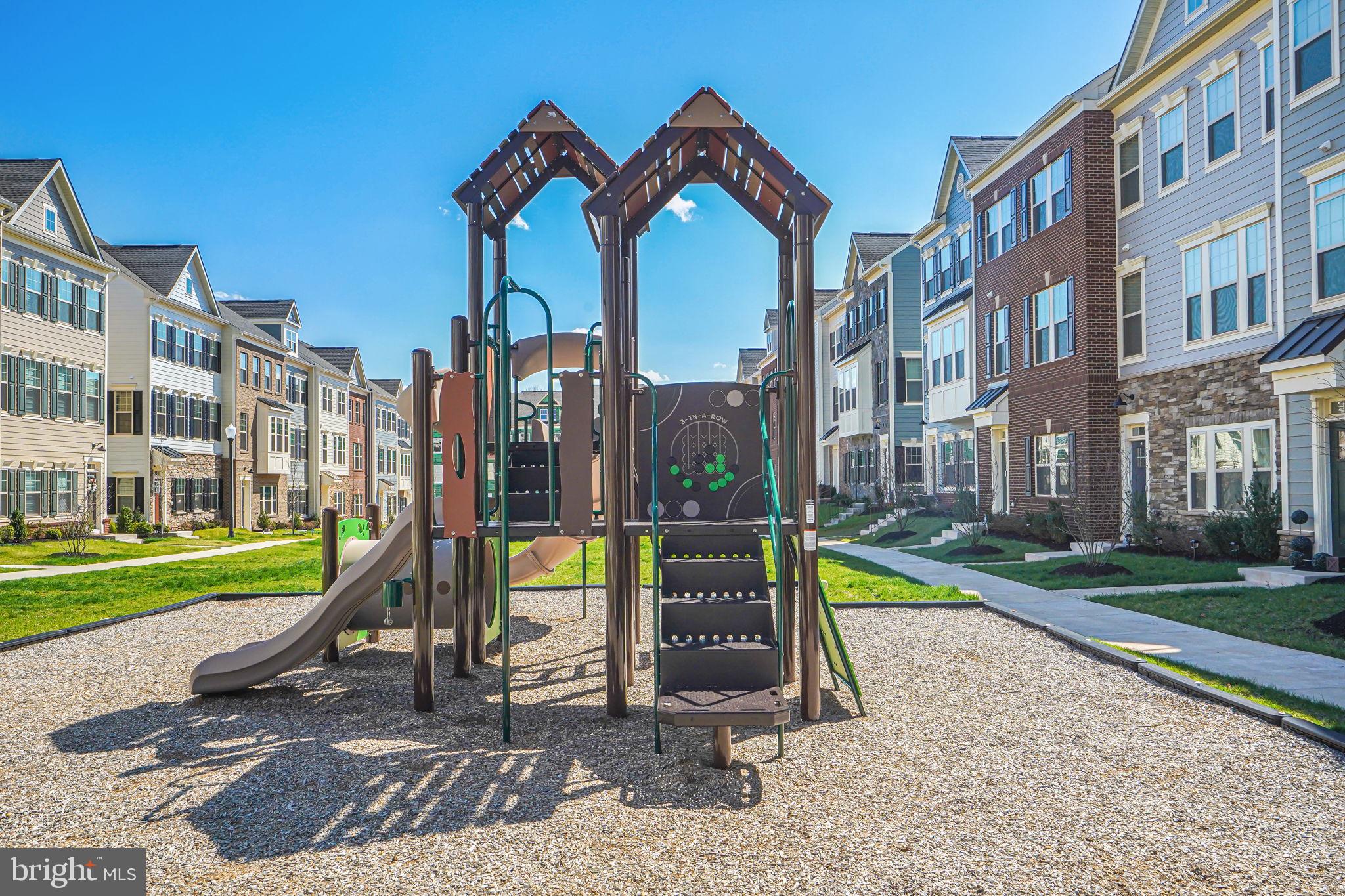 9536 Barnes Loop Manassas, VA 20110 - Photo 24 of 24 a view of a building with a park
