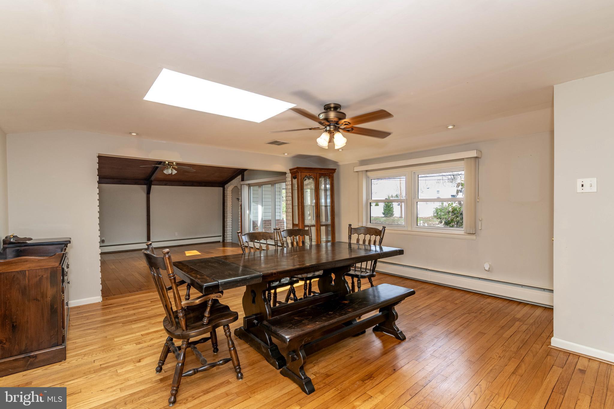 520 Powell Road Mount Holly, NJ 08060 - Photo 11 of 65 a view of a dining room with furniture and wooden floor