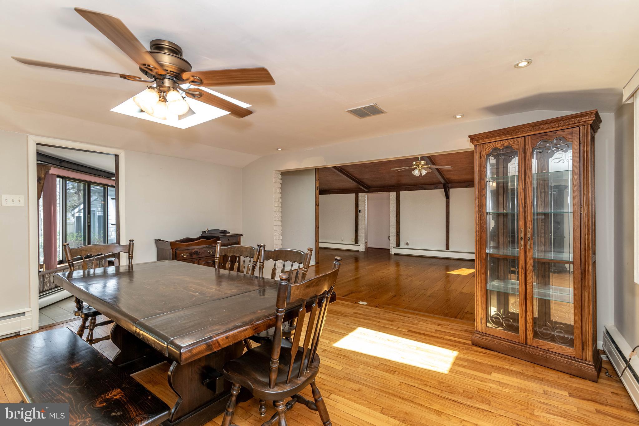 520 Powell Road Mount Holly, NJ 08060 - Photo 12 of 65 a view of a dining room with furniture window and wooden floor