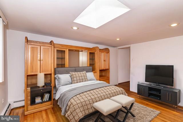 520 Powell Road Mount Holly, NJ 08060 - Photo 22 of 65 a bedroom with a bed and a flat screen tv