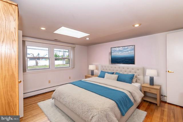 520 Powell Road Mount Holly, NJ 08060 - Photo 31 of 65 a bedroom with a large bed and a flat screen tv