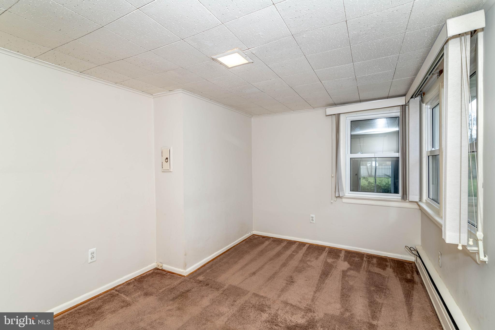 520 Powell Road Mount Holly, NJ 08060 - Photo 36 of 65 a view of empty room with wooden floor and fan