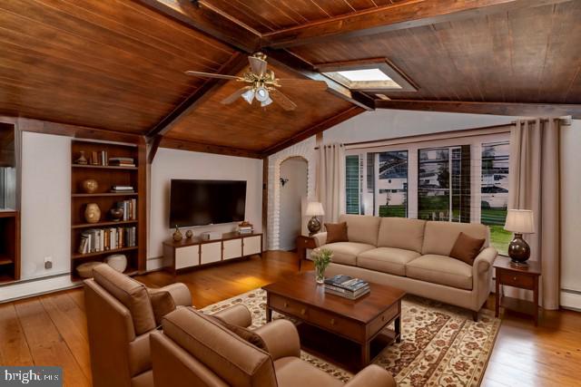 520 Powell Road Mount Holly, NJ 08060 - Photo 4 of 65 a living room with furniture and a flat screen tv