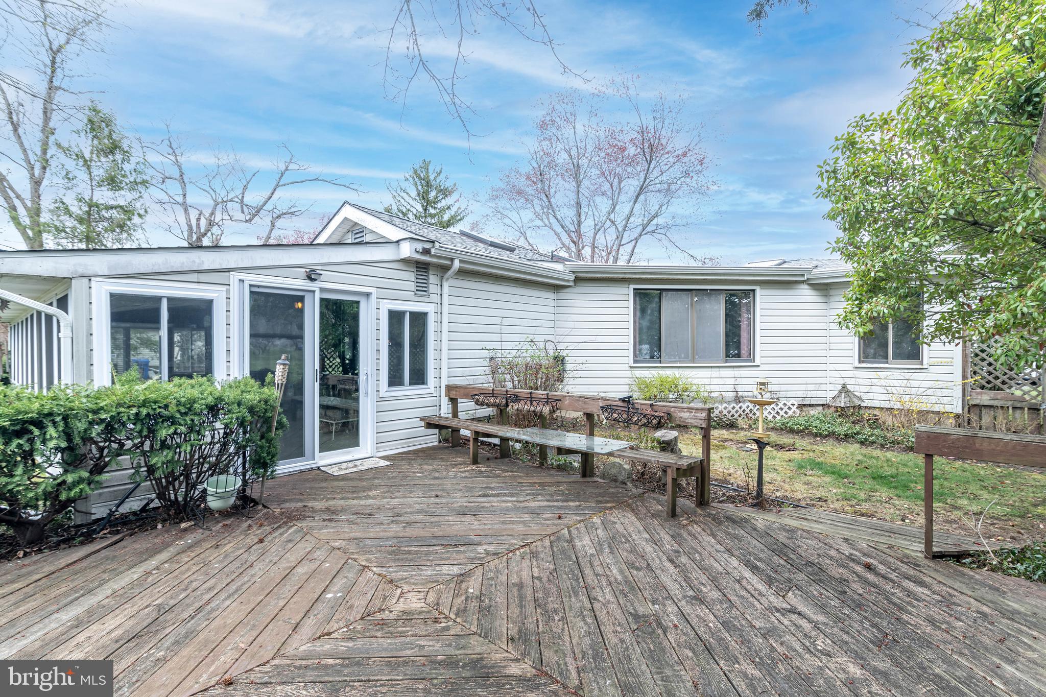 520 Powell Road Mount Holly, NJ 08060 - Photo 58 of 65 a view of a house with backyard sitting area and garden