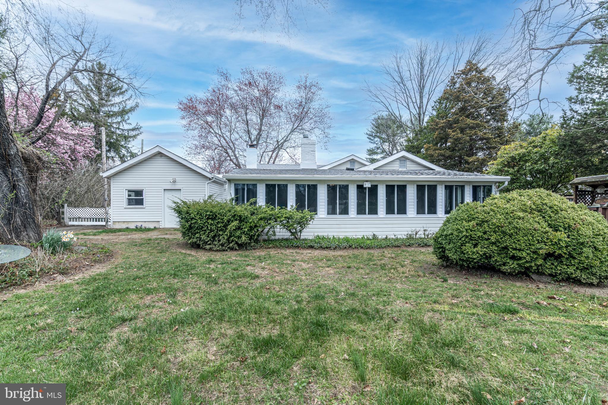 520 Powell Road Mount Holly, NJ 08060 - Photo 62 of 65 a view of a house with a yard and potted plants