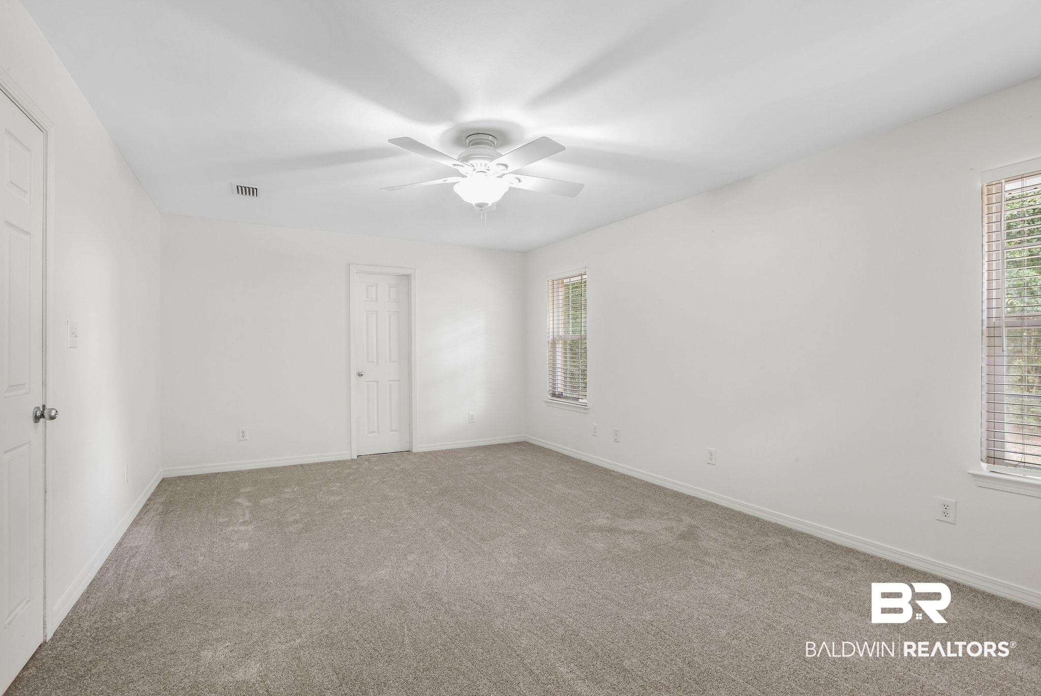 18620 Hammond Street Robertsdale, AL 36567 - Photo 8 of 23 Unfurnished bedroom with ceiling fan and carpet floors