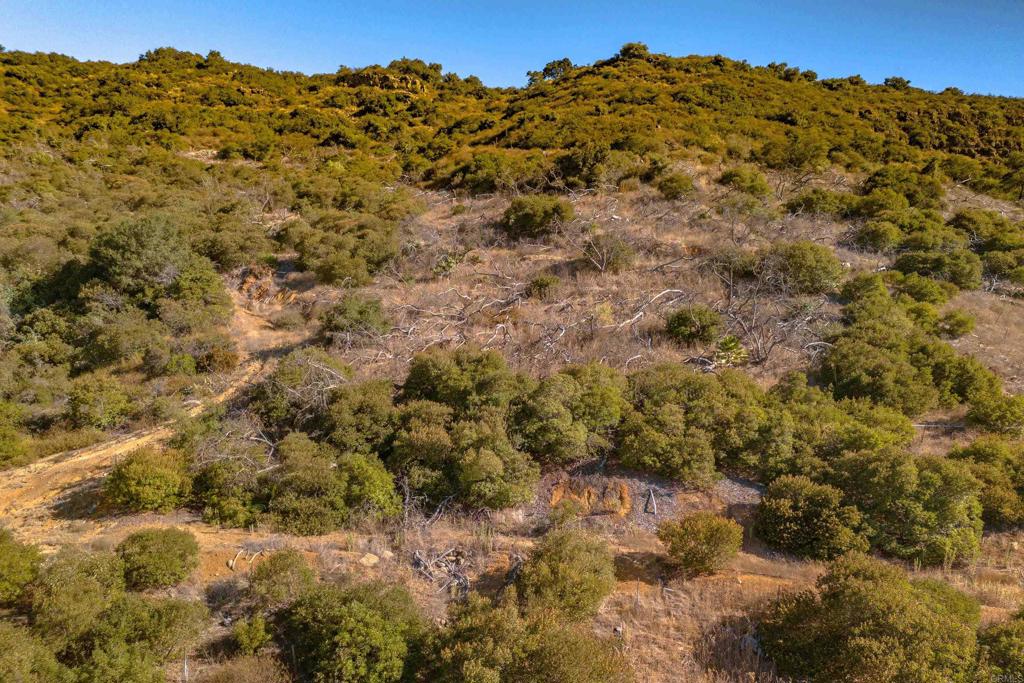 28 El Calamar Road Temecula, CA 92590 - Photo 21 of 33 a view of a large building with mountains in the background