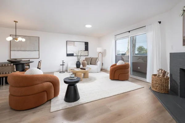 a bedroom with furniture and a chandelier