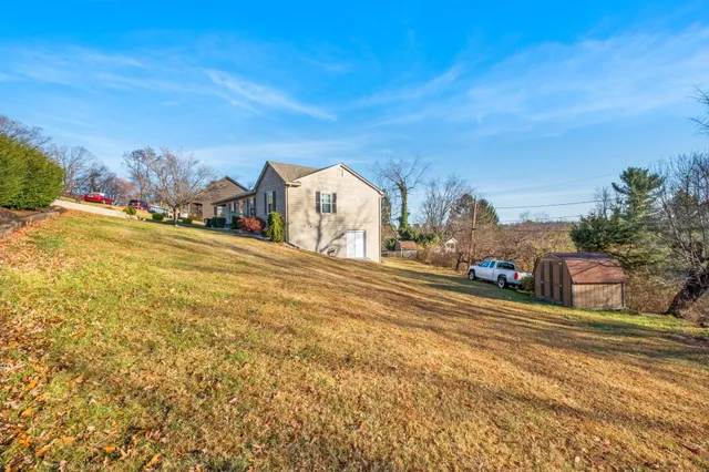 a view of a road with an ocean view