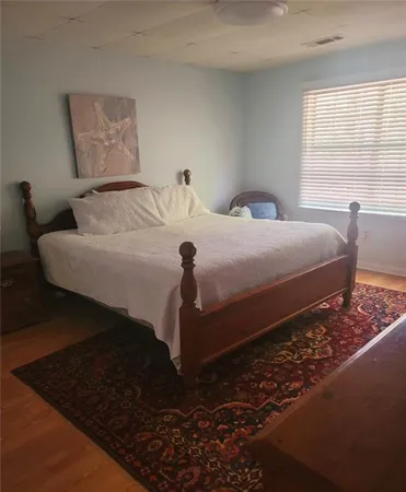 a walk in closet and window