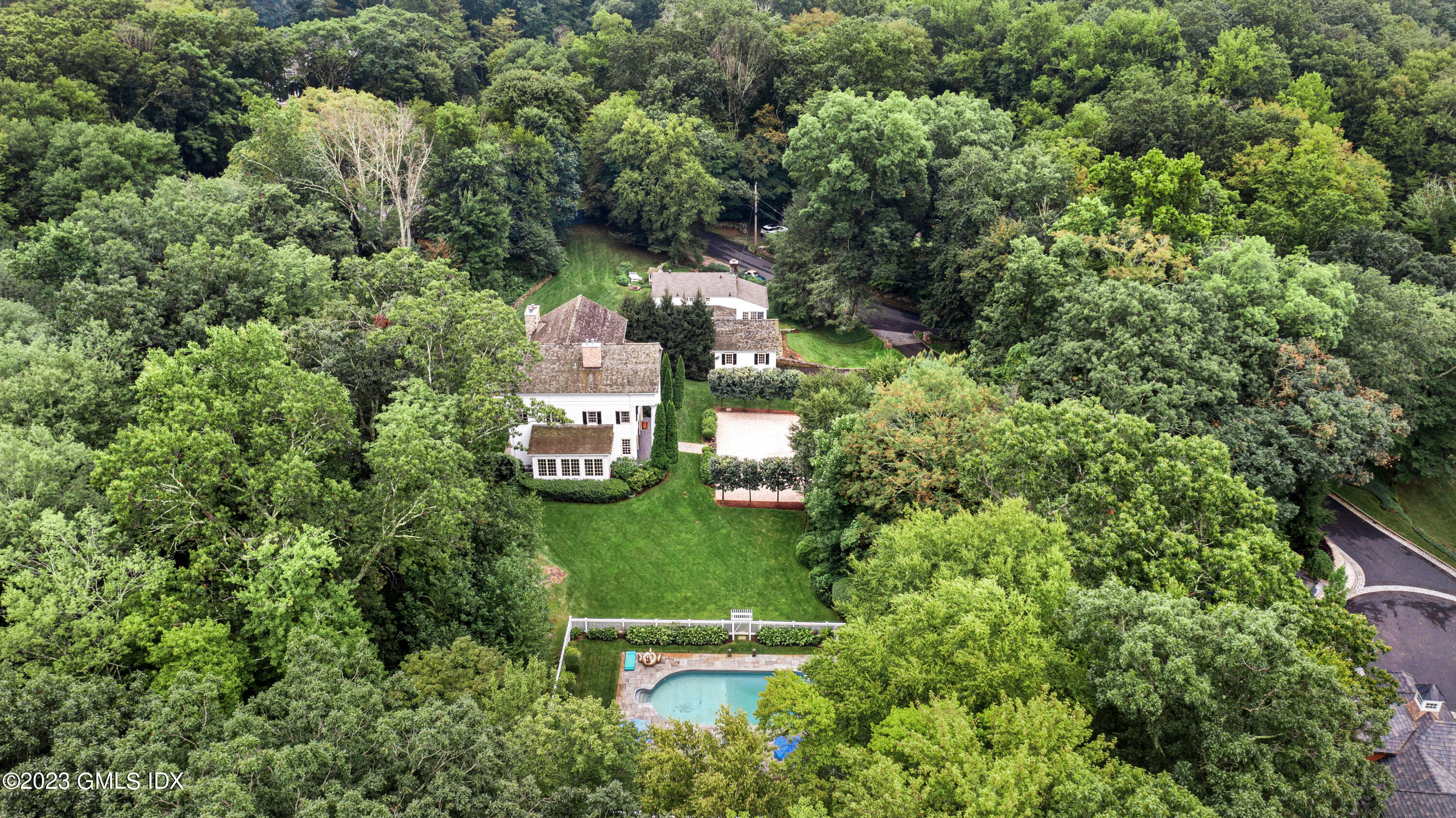 37 North Porchuck Road Greenwich, CT 06831 - Photo 14 of 63 an aerial view of a house with a yard