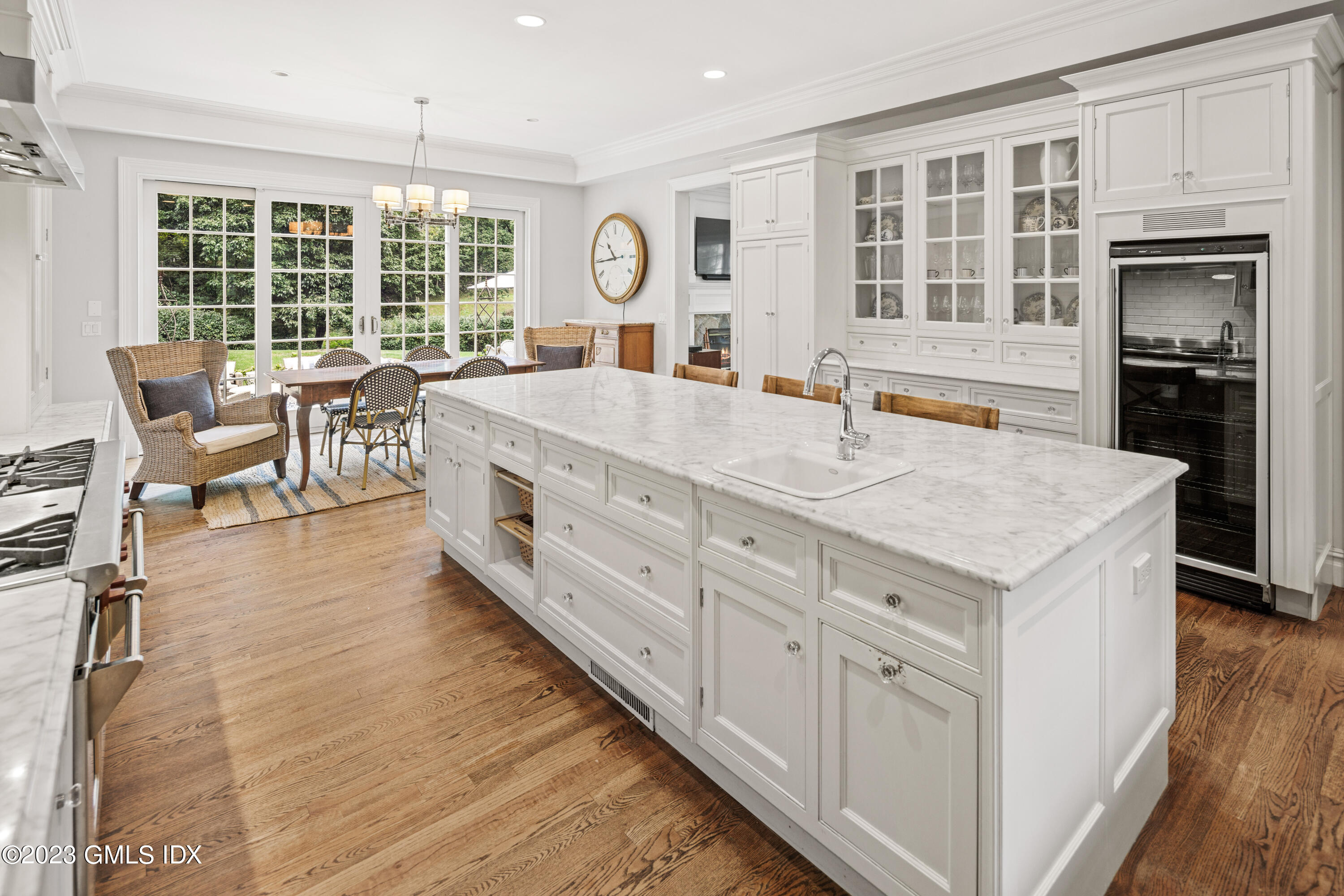 37 North Porchuck Road Greenwich, CT 06831 - Photo 24 of 63 a kitchen with center island and a wooden floor