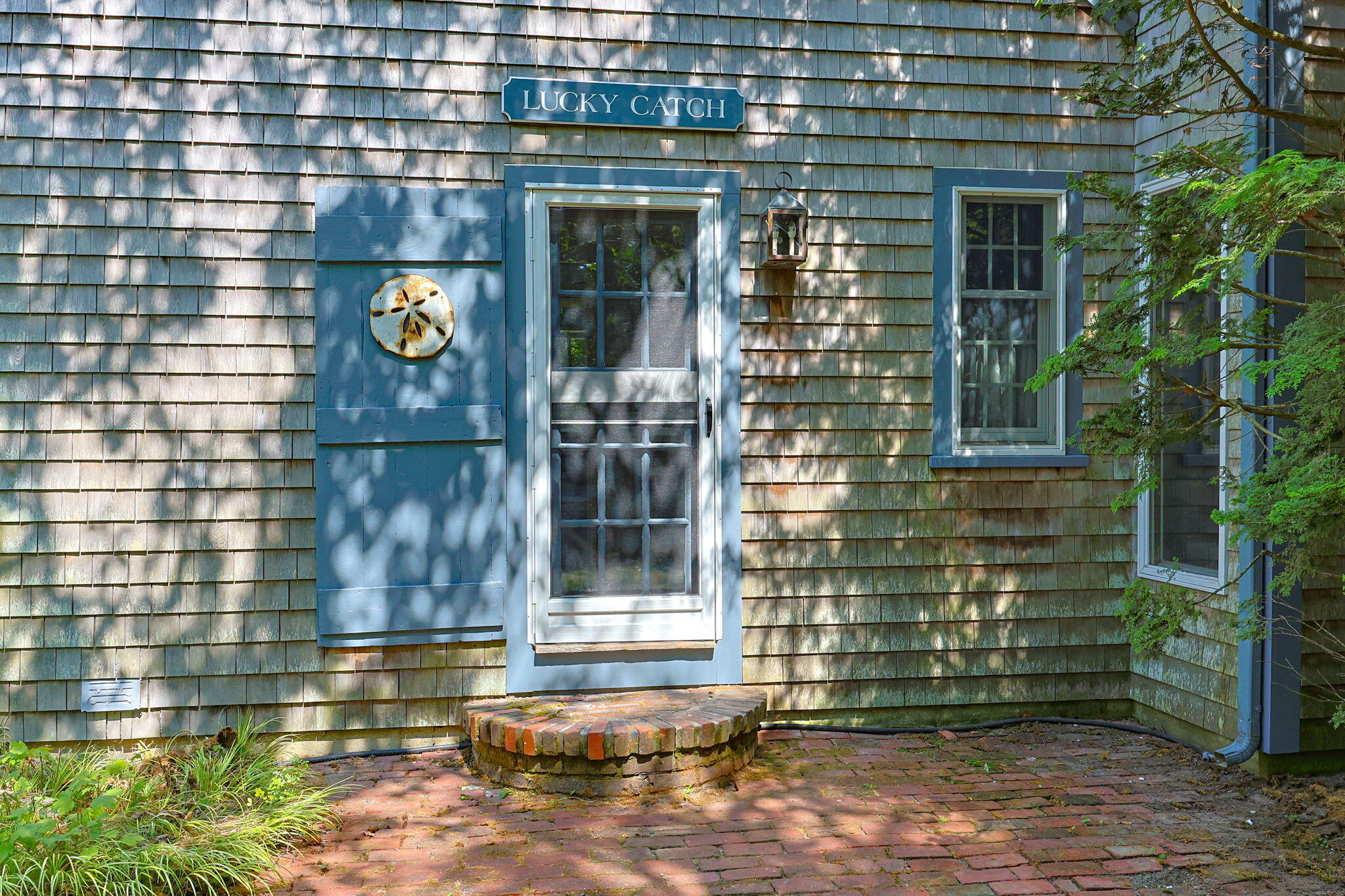 241 Tonset Road Orleans, MA 02653 - Photo 13 of 56 a view of a brick building with a window