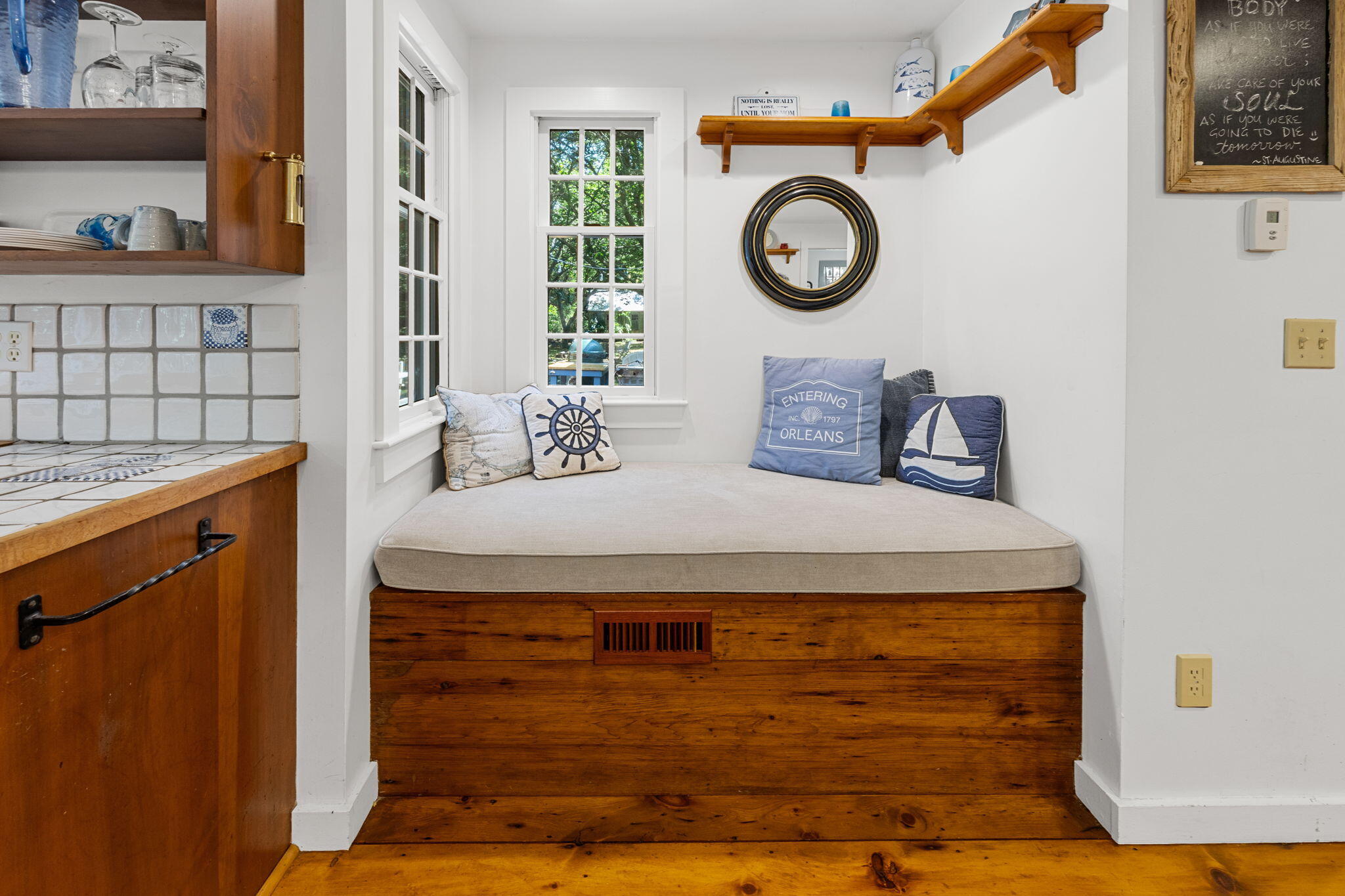 241 Tonset Road Orleans, MA 02653 - Photo 18 of 56 a bathroom with a granite countertop sink and a clock on it