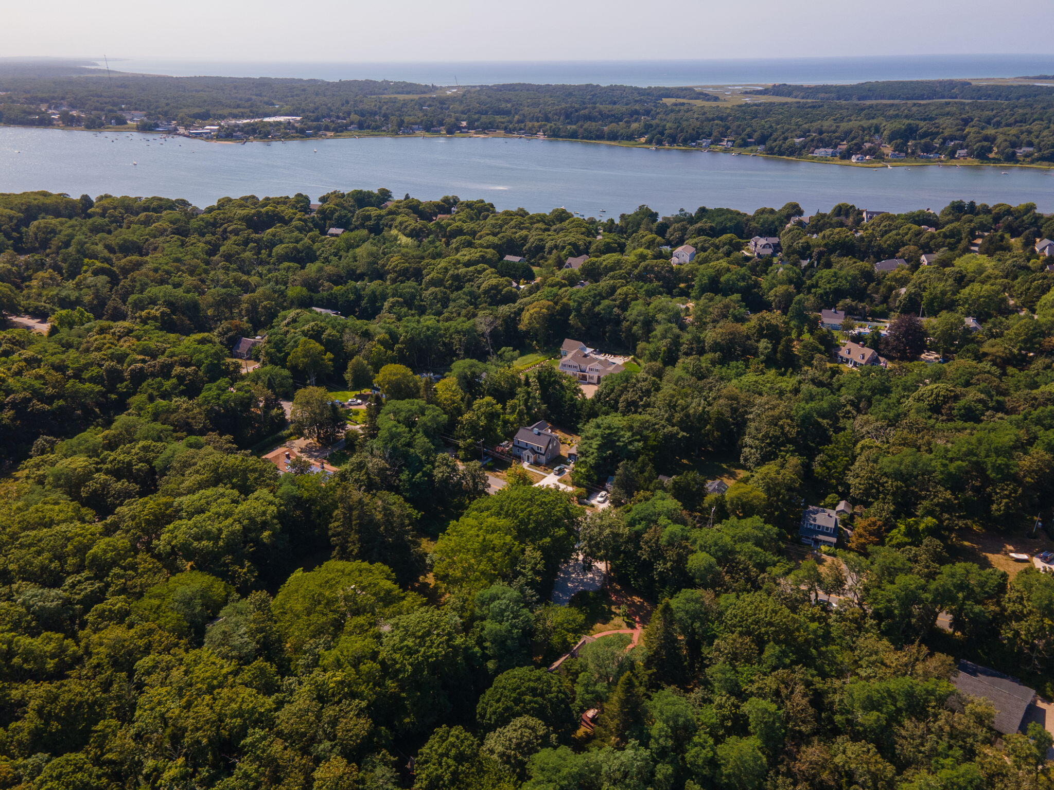 241 Tonset Road Orleans, MA 02653 - Photo 46 of 56 an aerial view of a houses with a lake