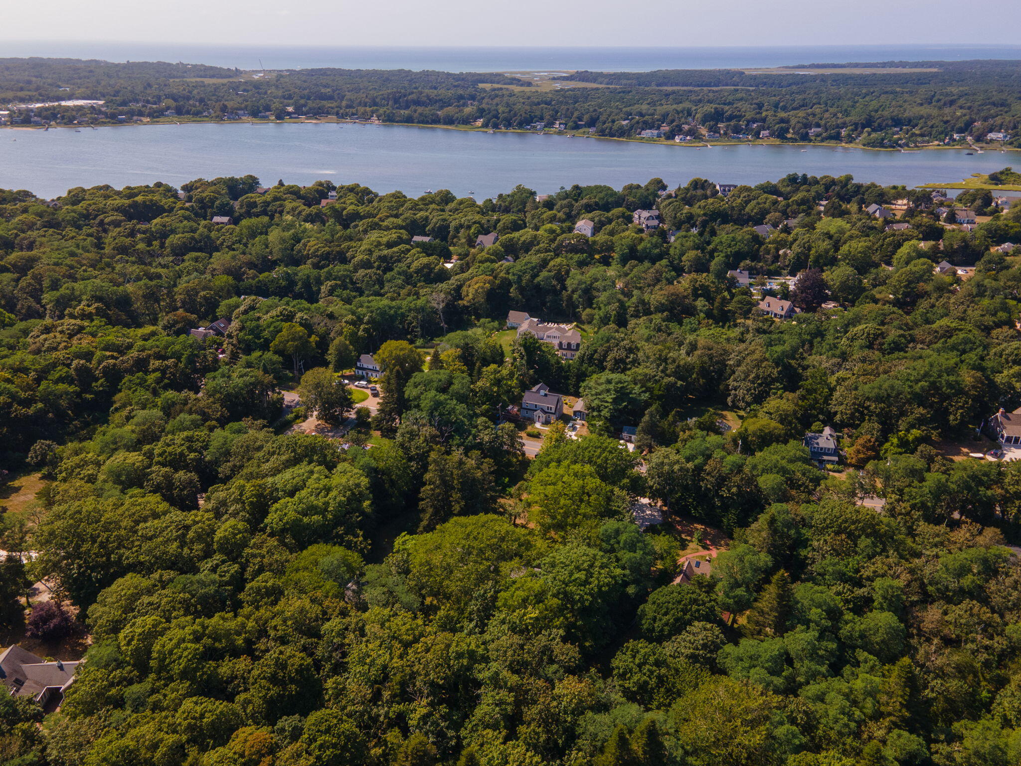 241 Tonset Road Orleans, MA 02653 - Photo 53 of 56 an aerial view of a houses with a lake view