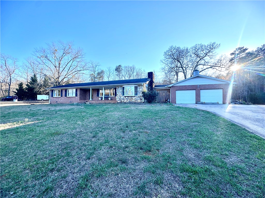 208 Pilgrim Circle Pickens, SC 29671 - Photo 1 of 29 This charming home features a classic brick/stone exterior and an attached two-car garage.