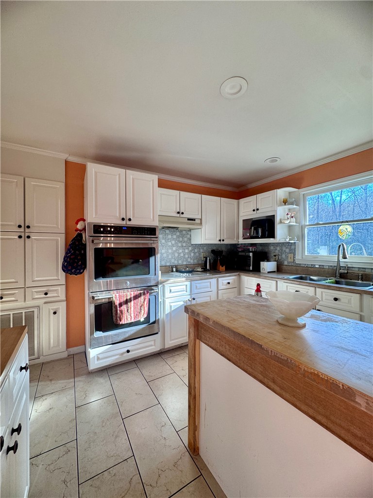208 Pilgrim Circle Pickens, SC 29671 - Photo 14 of 29 This spacious kitchen offers ample cabinetry and an inviting atmosphere for culinary endeavors.