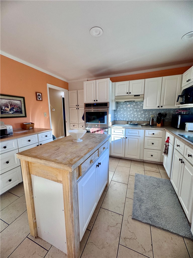 208 Pilgrim Circle Pickens, SC 29671 - Photo 15 of 29 This spacious kitchen offers ample cabinet storage and a practical central island for meal preparation.