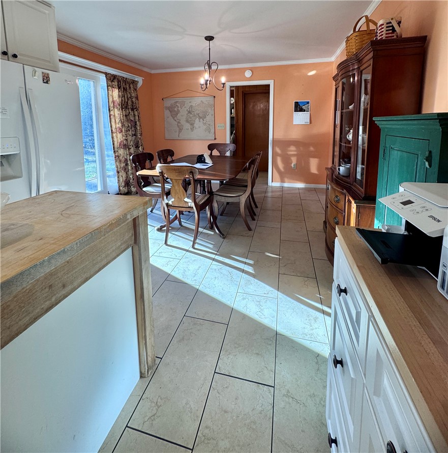 208 Pilgrim Circle Pickens, SC 29671 - Photo 19 of 29 This inviting dining area features ample natural light and durable tile flooring, perfect for everyday living.