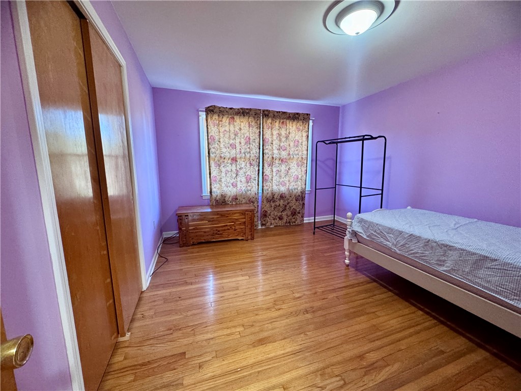 208 Pilgrim Circle Pickens, SC 29671 - Photo 20 of 29 This cozy bedroom features polished hardwood floors, offering a blend of warmth and timeless elegance.