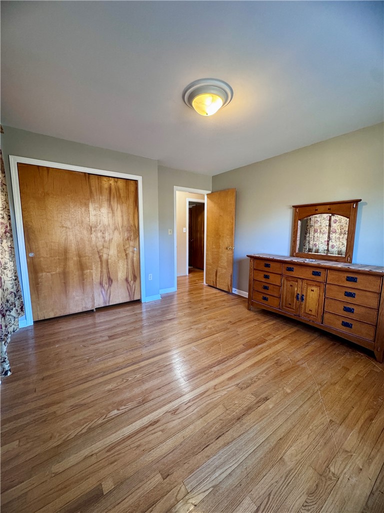 208 Pilgrim Circle Pickens, SC 29671 - Photo 22 of 29 This inviting bedroom offers warm hardwood flooring, ready for your personal touch.