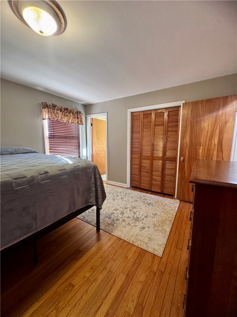 208 Pilgrim Circle Pickens, SC 29671 - Photo 26 of 29 This cozy bedroom offers rich hardwood floors, ample closet space, and a private ensuite bath.