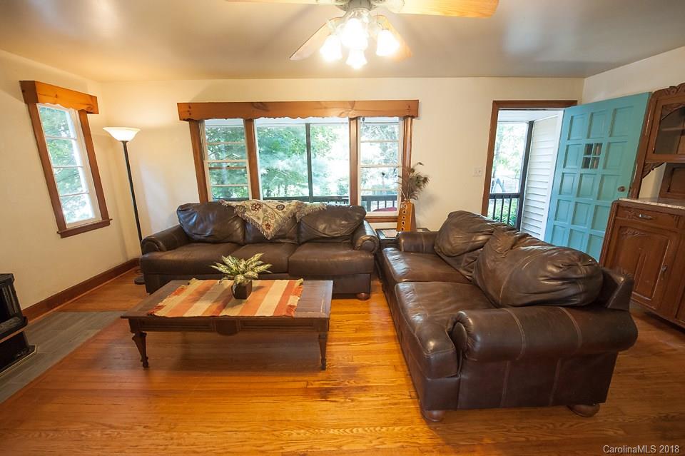 288 Deaverview Road, Unit B Asheville, NC 28806 - Photo 11 of 28 a living room with furniture and a large window