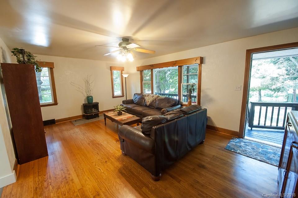 288 Deaverview Road, Unit B Asheville, NC 28806 - Photo 14 of 28 a living room with furniture and a large window