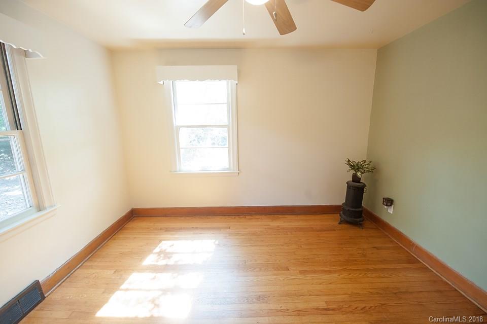 288 Deaverview Road, Unit B Asheville, NC 28806 - Photo 22 of 28 a view of an empty room and window