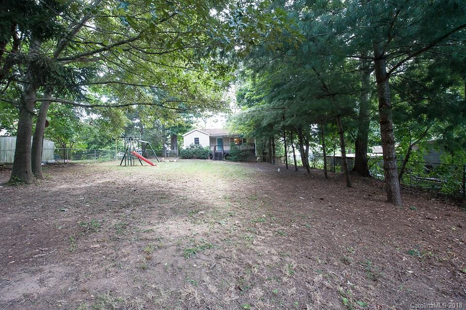 288 Deaverview Road, Unit B Asheville, NC 28806 - Photo 26 of 28 a view of a forest with trees in the background