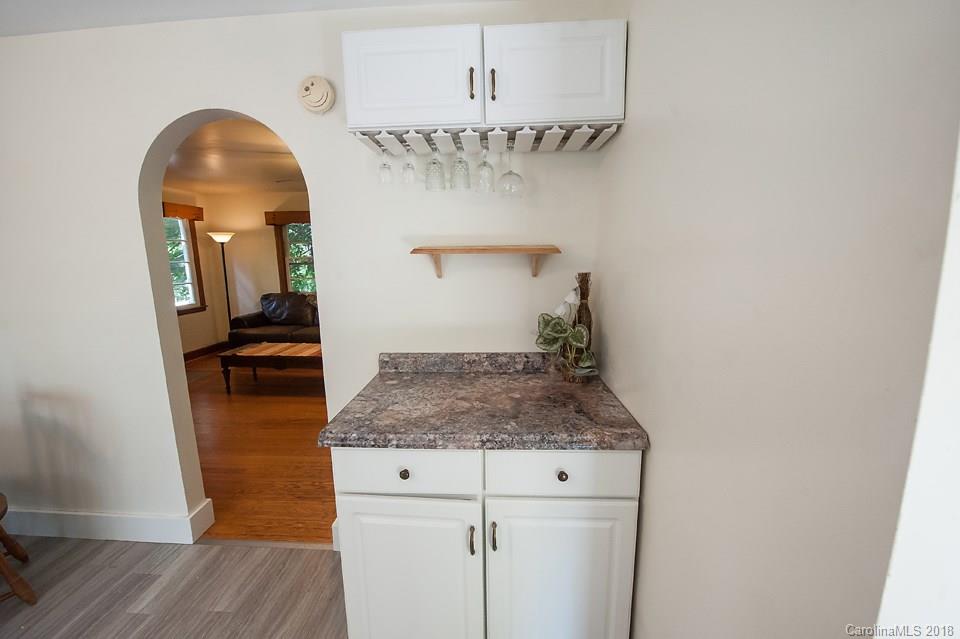 288 Deaverview Road, Unit B Asheville, NC 28806 - Photo 9 of 28 a room with sink and mirror